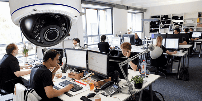 CCTV camera installed in an office for security and monitoring purposes.