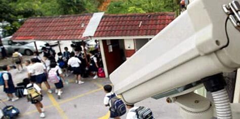 CCTV camera installed at school entrance for student safety and security.