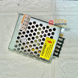 Power supply unit for CCTV systems with 5V/5A output. Compact and reliable for security camera insta.