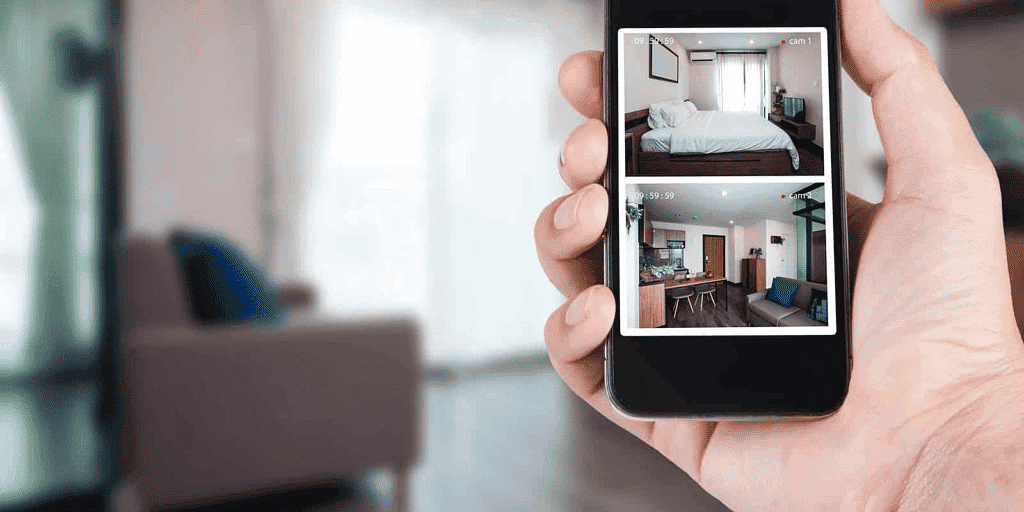 Home Security CCTV Monitoring Smartphone displaying live CCTV footage of home interior.