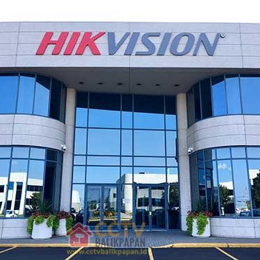 HIKVISION CCTV store exterior with large glass windows and signage.