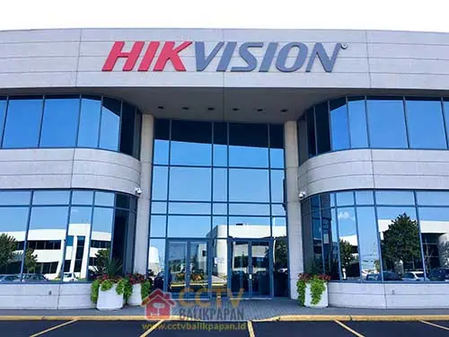 HIKVISION CCTV store exterior with large glass windows and signage.