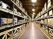 CCTV camera installed in a warehouse for security and inventory management.