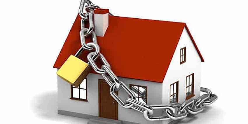 House secured with CCTV camera and chain lock for mudik safety.