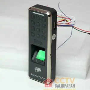 CCTV camera with fingerprint scanner and wiring for security system.