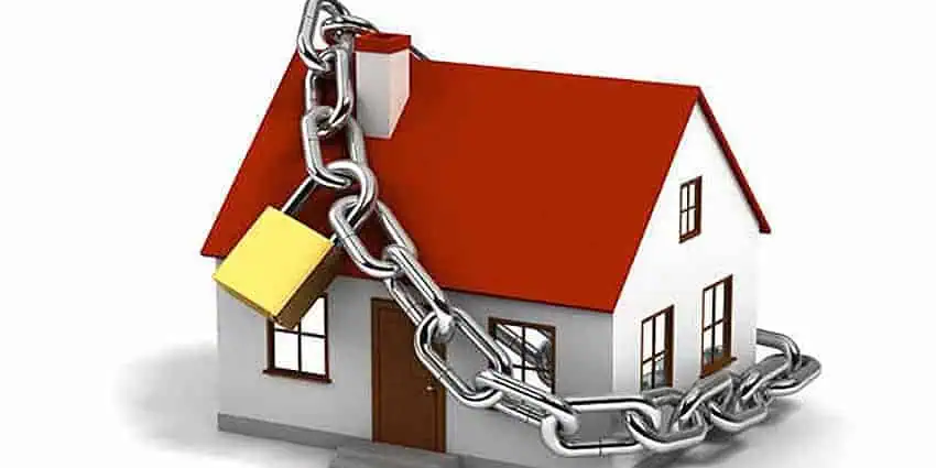 House secured with CCTV camera and chain lock for mudik safety.